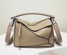 Hong Kong purchasing genuine leather bags 2024 new geometric bags, pillow bags, single shoulder hand-held crossbody spliced contrasting color women's bags