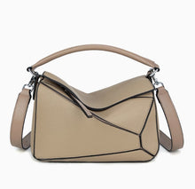 Hong Kong purchasing genuine leather bags 2024 new geometric bags, pillow bags, single shoulder hand-held crossbody spliced contrasting color women's bags